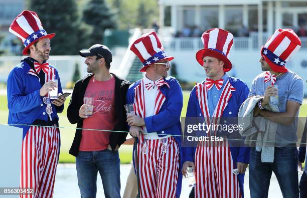 Fans of the U.S. Team look on during Sunday singles matches of the Presidents Cup at Liberty National Golf Club on October 1, 2017 in Jersey City,...
