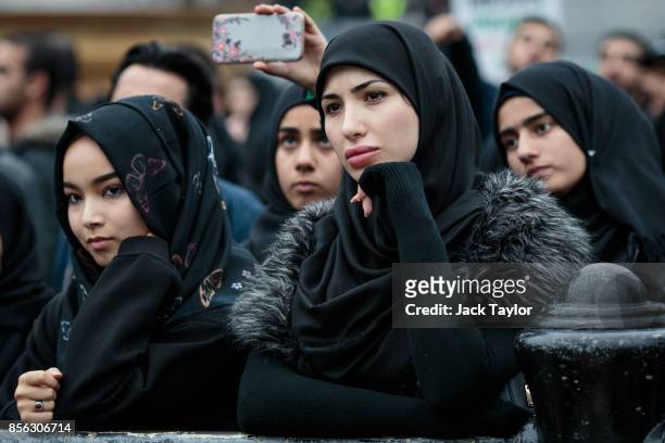 People listen to a speaker in Trafalgar Square following the annual Ashura march on October 1, 2017 in London, England. Thousands of protesters march...