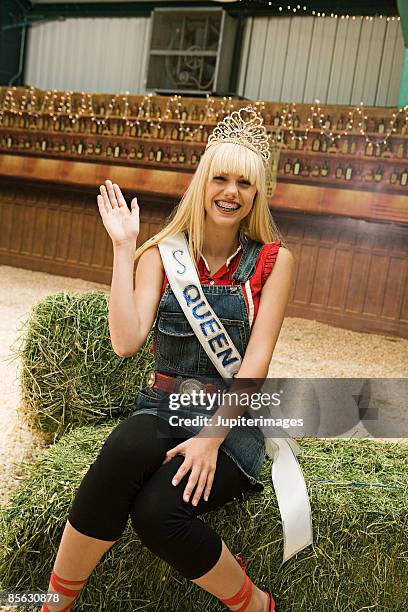 teenage beauty queen waving - winner sash stock pictures, royalty-free photos & images