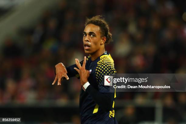 Yussuf Poulsen of RB Leipzig celebrates scoring his teams second goal of the game during the Bundesliga match between 1. FC Koeln and RB Leipzig at...