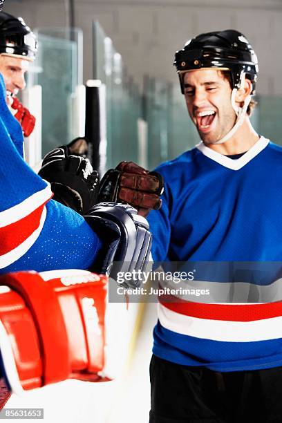 hockey players celebrating - ice hockey celebration stock pictures, royalty-free photos & images