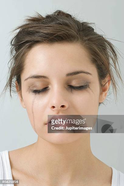 crying woman with smeared mascara - smudged stock pictures, royalty-free photos & images