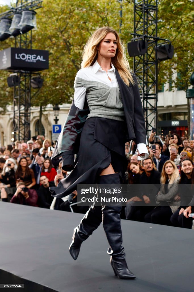 Super Models walk the runway during the Le Defile L'Oreal Paris show as part of the Paris Fashion Week