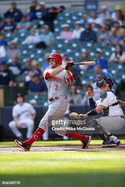 Patrick Kivlehan of the Cincinnati Reds makes some contact at the plate during the game against the Milwaukee Brewers at Miller Park on September 28,...