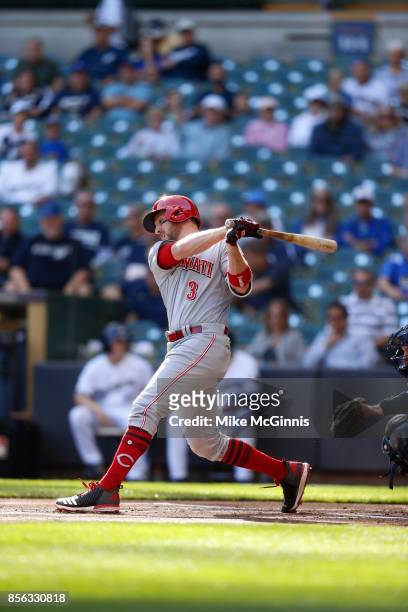 Patrick Kivlehan of the Cincinnati Reds makes some contact at the plate during the game against the Milwaukee Brewers at Miller Park on September 28,...