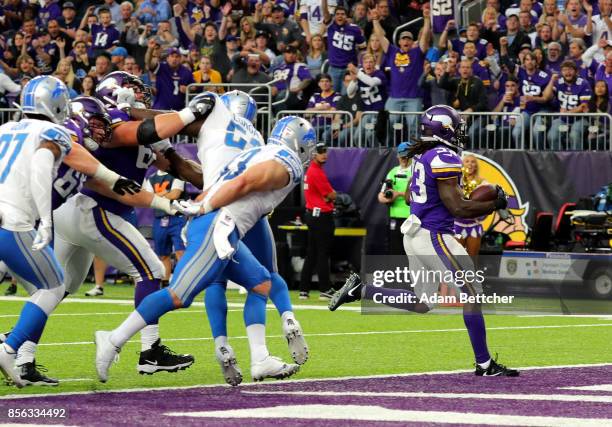 Dalvin Cook of the Minnesota Vikings scores a rushing touchdown in the second quarter of the game agains the Detroit Lions on October 1, 2017 at U.S....