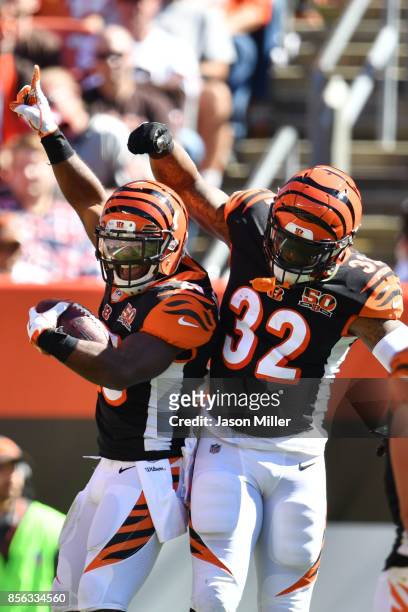 Giovani Bernard of the Cincinnati Bengals celebrates his touch down with Jeremy Hill of the Cincinnati Bengals against the Cleveland Browns at...