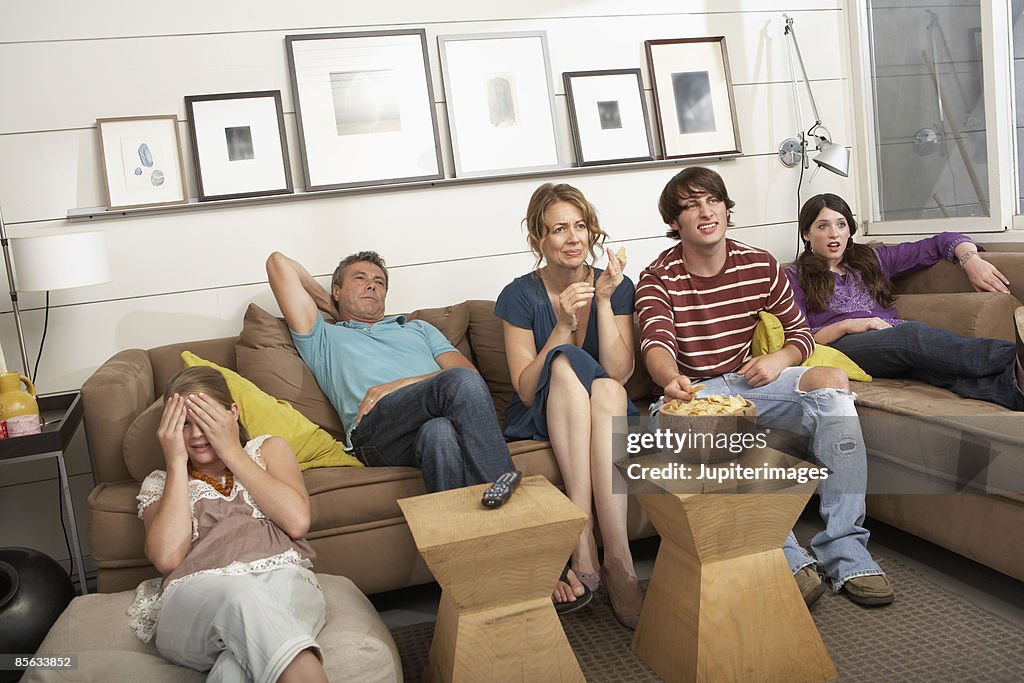 Family watching tv