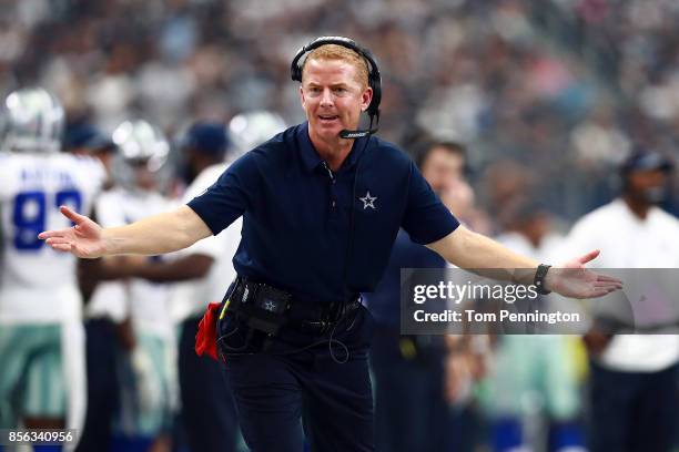 Head coach Jason Garrett of the Dallas Cowboys reacts toward a referee in the first half of a game against the Los Angeles Rams at AT&T Stadium on...