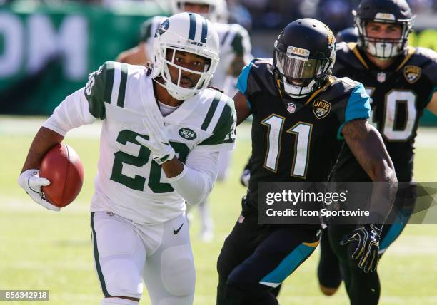 New York Jets cornerback Marcus Williams runs with the ball during the National Football League game between the Jacksonville Jaguars and the New...