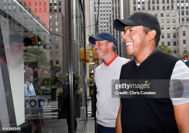 Jhonattan Vegas of Venezuela and the International Team and Matt Kuchar of the U.S. Team smile outside the window while on the Today Show prior to...