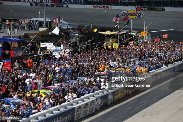 General view of pit road during the National Anthem prior to the Monster Energy NASCAR Cup Series Apache Warrior 400 presented by Lucas Oil at Dover...