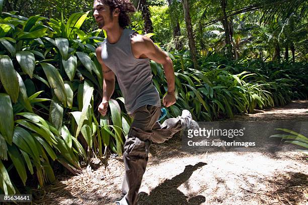 man running - antilles stock pictures, royalty-free photos & images