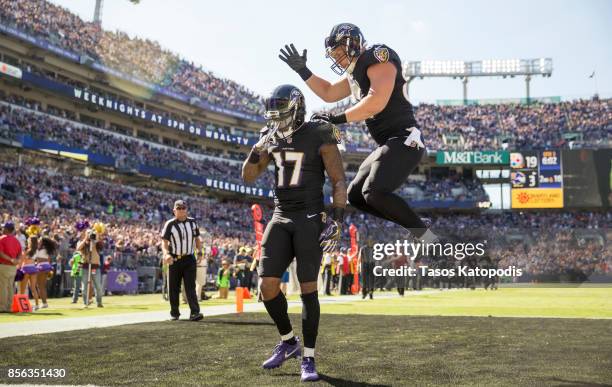 Mike Wallace of the Baltimore Ravens and Nick Boyle of the Baltimore Ravens celebrate a touchdown against the Pittsburgh Steelers in the third...