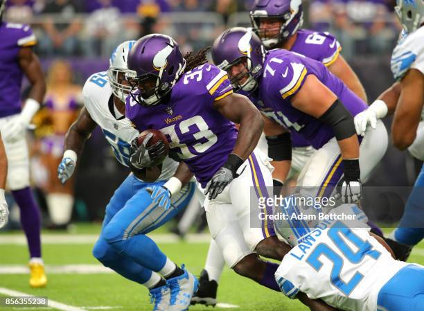 Dalvin Cook of the Minnesota Vikings carries the ball in the first quarter of the game against the Detroit Lions on October 1, 2017 at U.S. Bank...