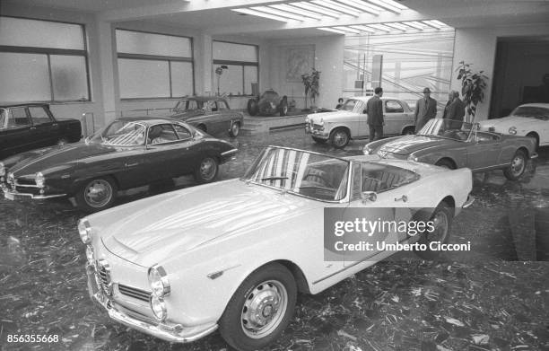 Rome Alfa Romeo showroom with a Giulietta Sprint Speciale, two Giulia Spider, a Dauphine, a Giulietta TI