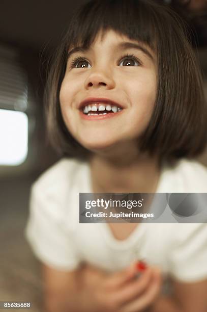 smiling brown-eyed girl - brown eyed girls stock pictures, royalty-free photos & images