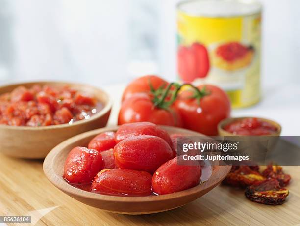 assorted tomato products - tomate fotografías e imágenes de stock