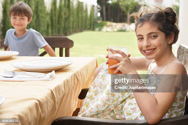 girl and boy at table - gazpacho stock pictures, royalty-free photos & images