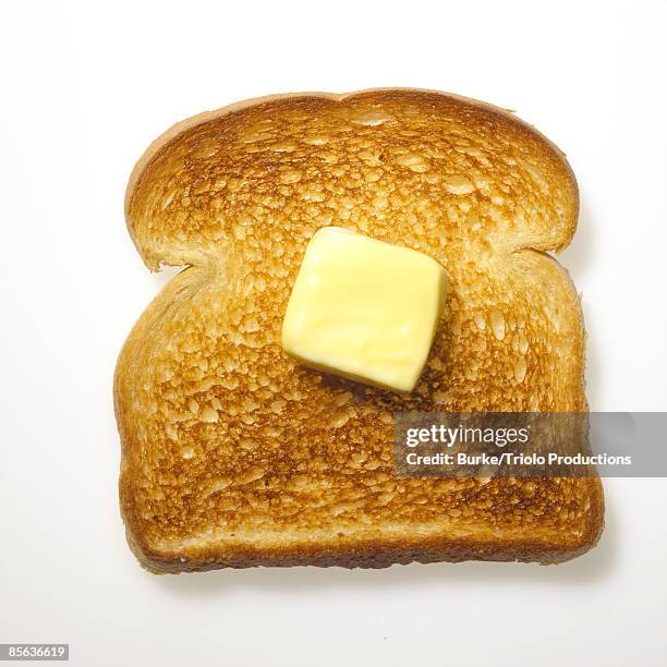 butter on toast - geroosterd brood stockfoto's en -beelden