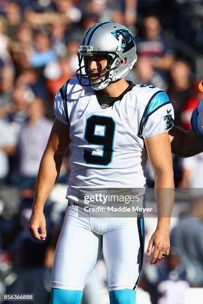 Graham Gano of the Carolina Panthers reacts after kicking a 48-yard field goal during the fourth quarter to defeat the New England Patriots 33-30 at...