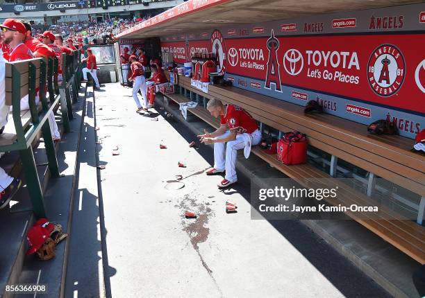 Parker Bridwell of the Los Angeles Angels of Anaheim sits in the dugout after pitching the second inning of the game against the Seattle Mariners at...