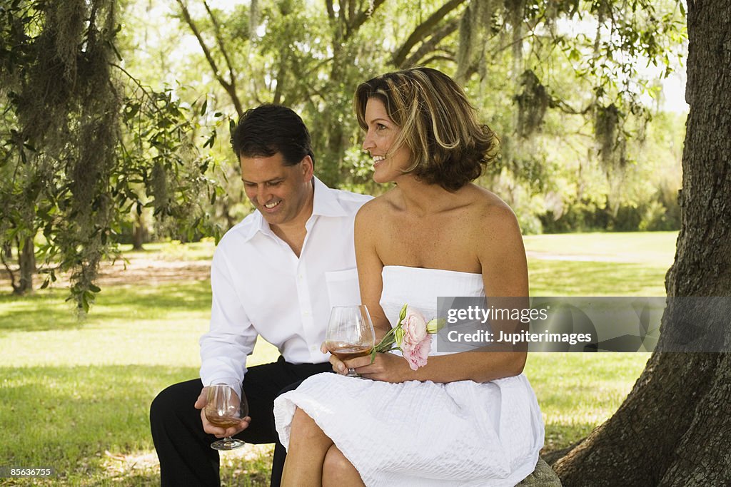 Man and woman with brandy snifters