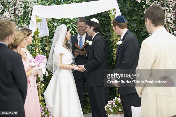 jewish wedding ceremony with chuppah - judaism fotografías e imágenes de stock