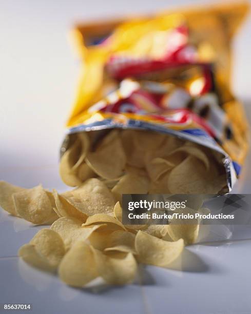 potato chips - bag of potato chips stockfoto's en -beelden