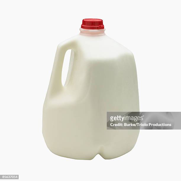 gallon of whole milk - galón fotografías e imágenes de stock