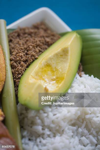 close-up of colombian bandeja paisa - bandeja stock pictures, royalty-free photos & images