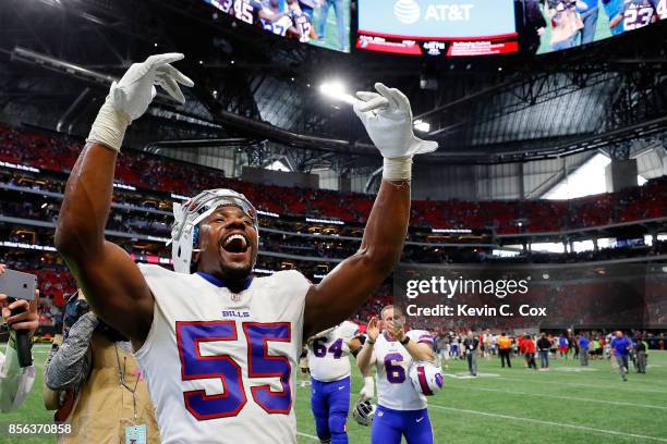 Jerry Hughes of the Buffalo Bills celebrates beating the Atlanta Falcons at Mercedes-Benz Stadium on October 1, 2017 in Atlanta, Georgia.