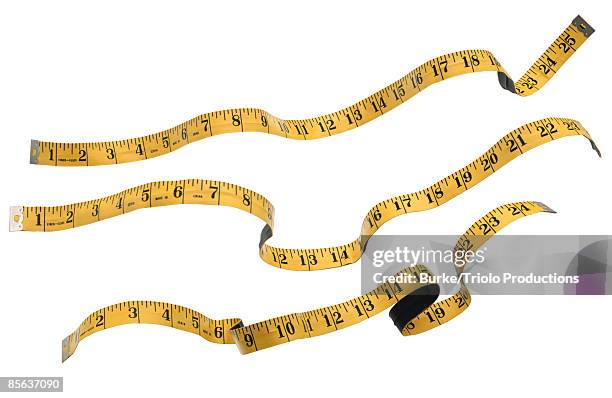 measuring tape - measuring tape stock-fotos und bilder