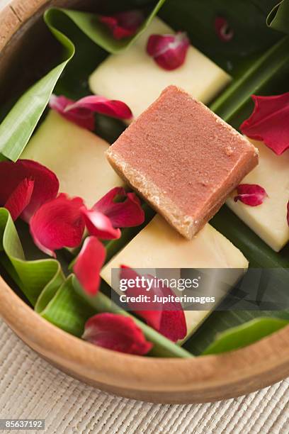 colombian bocadillo veleno guava candy and flower petals - veleno stock pictures, royalty-free photos & images