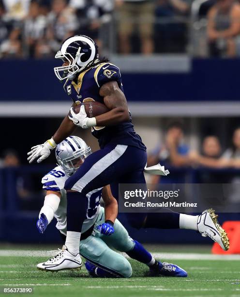 Todd Gurley of the Los Angeles Rams runs past Jeff Heath of the Dallas Cowboys for a touchdown in the third quarter at AT&T Stadium on October 1,...