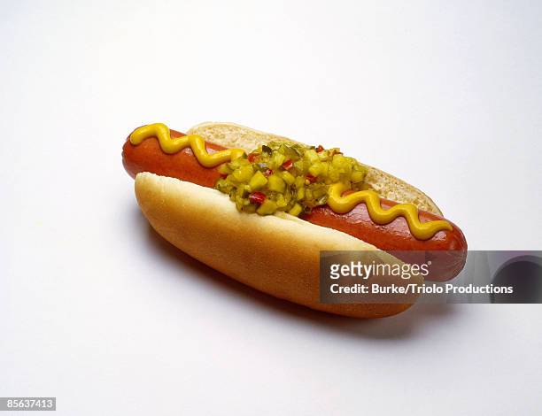 hot dog with mustard and relish - frankfurt fotografías e imágenes de stock