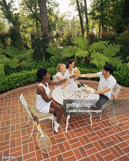 friends toasting - table tennis table photos et images de collection