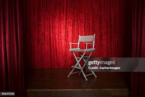 director's chair on stage - director chair stock pictures, royalty-free photos & images
