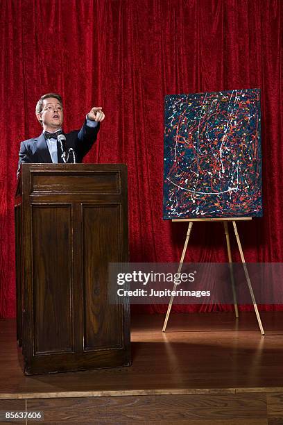 auctioneer and painting - auctioneer stock pictures, royalty-free photos & images