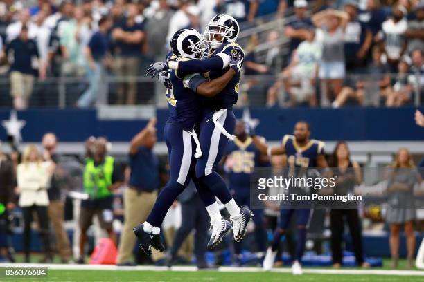Kayvon Webster of the Los Angeles Rams celebrates with Maurice Alexander of the Los Angeles Rams after the Los Angeles Rams beat the Dallas Cowboys...