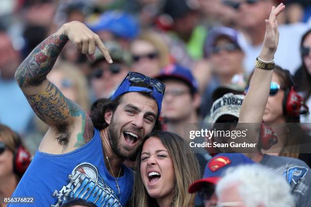 Race fans look on during the Monster Energy NASCAR Cup Series Apache Warrior 400 presented by Lucas Oil at Dover International Speedway on October 1,...