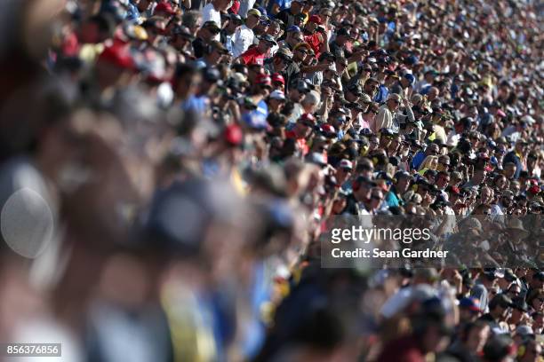 Race fans look on during the Monster Energy NASCAR Cup Series Apache Warrior 400 presented by Lucas Oil at Dover International Speedway on October 1,...