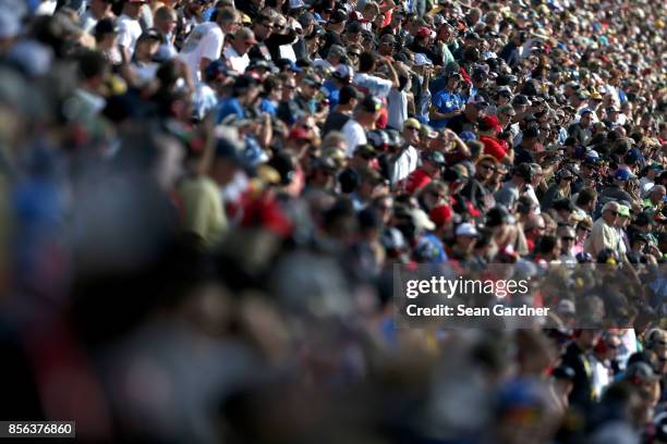 Race fans look on during the Monster Energy NASCAR Cup Series Apache Warrior 400 presented by Lucas Oil at Dover International Speedway on October 1,...