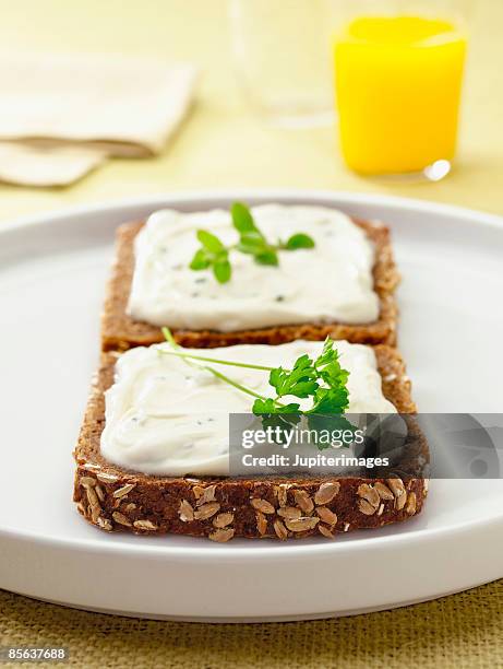 rye bread with cheese spread - cheese spread ストックフォトと画像