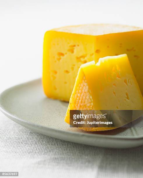 wedge of cheese - cheese wedge foto e immagini stock
