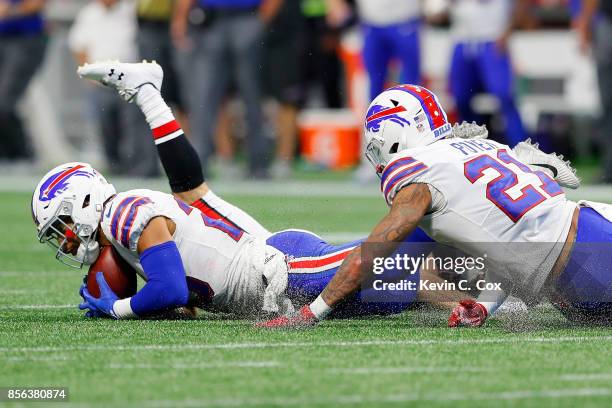 Micah Hyde of the Buffalo Bills intercepts a ball intended for Nick Williams of the Atlanta Falcons during the second half at Mercedes-Benz Stadium...