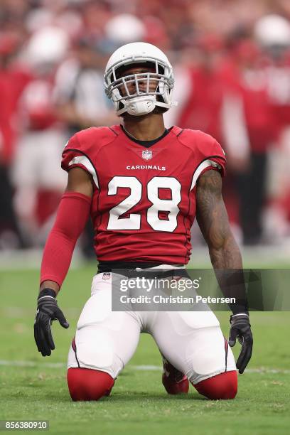 Cornerback Justin Bethel of the Arizona Cardinals reacts after breaking up a play during the first half of the NFL game against the San Francisco...