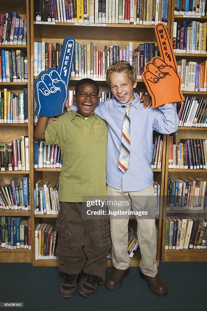 Boys with foam hands