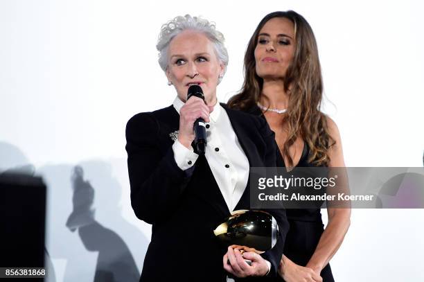 Glenn Close and Sandra Studer speak during the Golden Icon Award ceremony at the 'The Wife' premiere at the 13th Zurich Film Festival on October 1,...