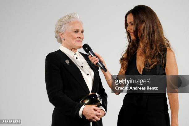 Glenn Close and Sandra Studer speak during the Golden Icon Award ceremony at the 'The Wife' premiere at the 13th Zurich Film Festival on October 1,...